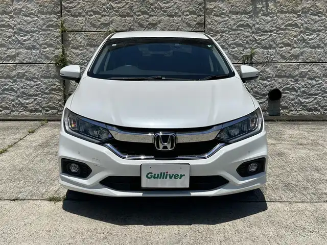 ホンダ グレイス ハイブリッド EX 長崎県 2020(令2)年 7.2万km プラチナホワイトパール 純正メモリナビ/　(CD DVD BT USB AUX ワンセグTV)/クルーズコントロール/バックカメラ/パドルシフト/純正ドライブレコーダー/シートヒーター/ハーフレザーシート/コーナーセンサー/ビルドインETC/オートライト/LEDヘッドライト/純正16インチアルミホイール/横滑り防止機能/スマートキー/スペアキー×1/保証書　取扱説明書