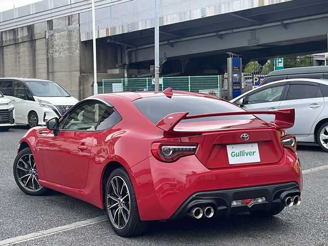 トヨタ ８６ GT 東京都 2016(平28)年 6.1万km ピュアレッド 純正メモリナビ/CD/DVD/BT/バックカメラ/ETC/TRDマフラー/HKSエアクリーナー/ROWANリアスポイラー/フルセグテレビ