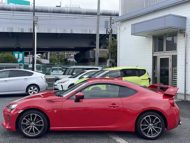トヨタ ８６ GT 東京都 2016(平28)年 6.1万km ピュアレッド 純正メモリナビ/CD/DVD/BT/バックカメラ/ETC/TRDマフラー/HKSエアクリーナー/ROWANリアスポイラー/フルセグテレビ