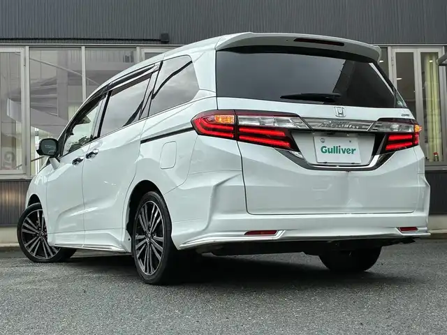 ホンダ オデッセイ アブソルート EX 京都府 2015(平27)年 7.5万km ホワイトオーキッドパール インターナビ/・マルチビューカメラ/・スマートパーキングアシストシステム/・フルセグTV/・CD/DVD再生/・HDMI/USB入力端子/・BT接続/リアエンターテイメントシステム/Bin ETC/社外ドラレコ/両側パワースライドドア/ホンダセンシング/・衝突軽減ブレーキ/・誤発進抑制機能/・先行車発進お知らせ機能/・車線維持支援システム/・標識認識機能/・路外逸脱抑制機能/・アダプティブクルーズコントロール/ハーフレザーシート/・運転席パワーシート/2列目シートオットマン付キャプテンシート/レザーステアリング/・パドルシフト/・ステアリモコン/トリプルゾーンフルオートエアコン/プッシュスタート/・スマートキー/LEDヘッドライト/・フォグランプ/純正18インチアルミホイール/純正ドアバイザー/純正フロアマット/車両保証書/車両取説