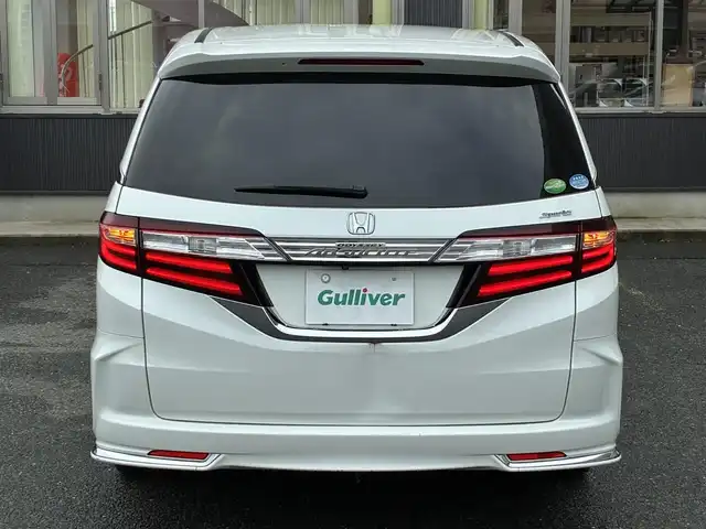 ホンダ オデッセイ アブソルート EX 京都府 2015(平27)年 7.5万km ホワイトオーキッドパール インターナビ/・マルチビューカメラ/・スマートパーキングアシストシステム/・フルセグTV/・CD/DVD再生/・HDMI/USB入力端子/・BT接続/リアエンターテイメントシステム/Bin ETC/社外ドラレコ/両側パワースライドドア/ホンダセンシング/・衝突軽減ブレーキ/・誤発進抑制機能/・先行車発進お知らせ機能/・車線維持支援システム/・標識認識機能/・路外逸脱抑制機能/・アダプティブクルーズコントロール/ハーフレザーシート/・運転席パワーシート/2列目シートオットマン付キャプテンシート/レザーステアリング/・パドルシフト/・ステアリモコン/トリプルゾーンフルオートエアコン/プッシュスタート/・スマートキー/LEDヘッドライト/・フォグランプ/純正18インチアルミホイール/純正ドアバイザー/純正フロアマット/車両保証書/車両取説