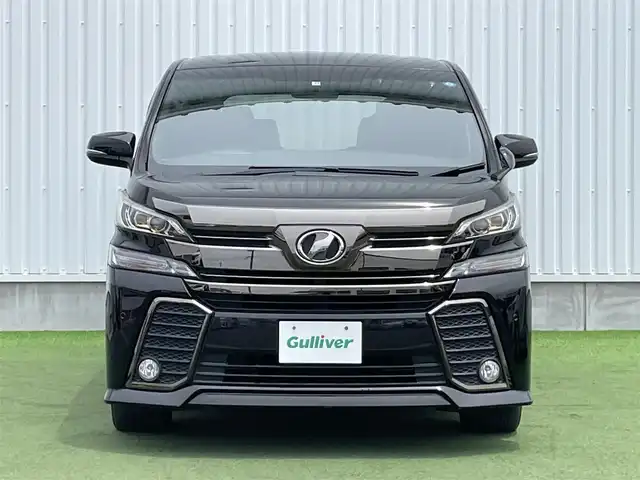 トヨタ ヴェルファイア Z Aエディション ゴールデンアイズ 香川県 2017(平29)年 3.8万km ブラック 純正18インチAW/前後コーナーセンサー/電動リアゲート/両側パワースライドドア/１００V充電/オットマン/後席フリップダウンモニター/クルーズコントロール/バックカメラ/純正メモリナビ（CD/DVD/BT）/フルセグテレビ/Fフォグ/LEDヘッドライト/ビルトインETC/横滑り防止装置/盗難防止装置/ダブル＋サイドエアバッグ/カーテンエアバッグ/純正フロアマット