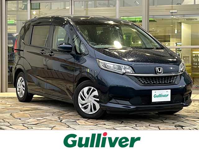 ホンダ フリード＋ G ホンダセンシング 静岡県 2020(令2)年 5.9万km ミッドナイトブルービームM 社外9型メモリーナビ/・CD/DVD/・SD/MSV/・FM/AM/・Bluetooth/・USB/・フルセグTV/主要装備/・両側パワースライドドア/・スマートキー/・プッシュスタート/・レーンキープアシスト/・LEDヘッドライト/・ホンダセンシング/・ビルトインETC/・運転席＆助手席シートヒーター/ ・プラズマクラスターAAC