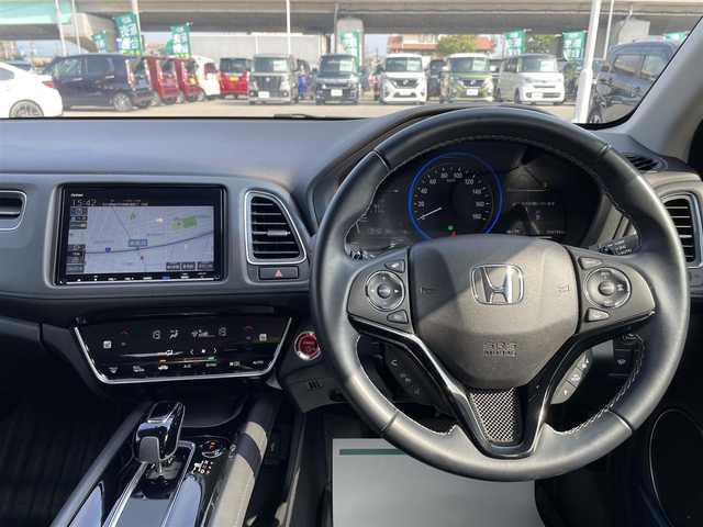 ホンダ ヴェゼル ハイブリッド Z ホンダセンシング 石川県 2020(令2)年 6.7万km プラチナホワイトパール 4WD/純正8型ナビ/CD/DVD/フルセグTV/バックカメラ/LEDヘッドライト/ETC/スマートキー/プッシュスタート/電動ミラー/ホンダセンシング/レーダークルーズ/ハーフレザーシート/ドライブレコーダー/保証書