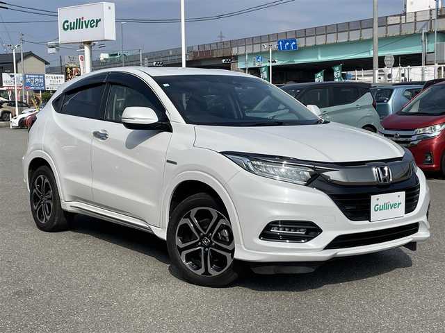 ホンダ ヴェゼル ハイブリッド Z ホンダセンシング 石川県 2020(令2)年 6.7万km プラチナホワイトパール 4WD/純正8型ナビ/CD/DVD/フルセグTV/バックカメラ/LEDヘッドライト/ETC/スマートキー/プッシュスタート/電動ミラー/ホンダセンシング/レーダークルーズ/ハーフレザーシート/ドライブレコーダー/保証書