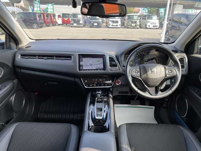 ホンダ ヴェゼル ハイブリッド Z ホンダセンシング 石川県 2020(令2)年 6.7万km プラチナホワイトパール 4WD/純正8型ナビ/CD/DVD/フルセグTV/バックカメラ/LEDヘッドライト/ETC/スマートキー/プッシュスタート/電動ミラー/ホンダセンシング/レーダークルーズ/ハーフレザーシート/ドライブレコーダー/保証書