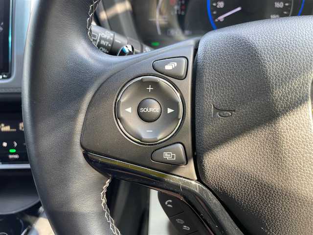 ホンダ ヴェゼル ハイブリッド Z ホンダセンシング 石川県 2020(令2)年 6.7万km プラチナホワイトパール 4WD/純正8型ナビ/CD/DVD/フルセグTV/バックカメラ/LEDヘッドライト/ETC/スマートキー/プッシュスタート/電動ミラー/ホンダセンシング/レーダークルーズ/ハーフレザーシート/ドライブレコーダー/保証書