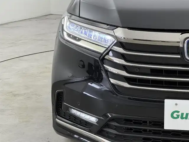 ホンダ オデッセイ ハイブリッド e:HEVアブソルート EX 福岡県 2022(令4)年 1.7万km プレミアムスパークルブラックパール 純正１０型ナビ　/全方位カメラ　/ＥＴＣ２．０　/前後ドラレコ　/アダプティブクルコン　/コーナーセンサー　/ホンダセンシング　/パーキングアシスト　/ＢＳＭ　/両電動スライドドア　/ハーフレザー　/シートヒーター　/ＬＥＤ
