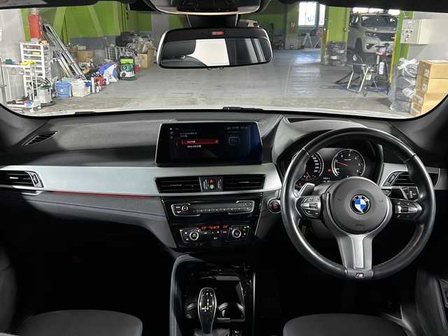 ＢＭＷ Ｘ１ xDrive 18d Mスポーツ 沖縄県 2021(令3)年 3.7万km アルピンホワイトⅢ 禁煙車　/純正ナビ　/（Ｂｌｕｅｔｏｏｔｈ　ＦＭ　ＡＭ　ＵＳＢ）　/バックカメラ/メモリー機能付きパワーシート　/オットマン（N席）　/アダプティブクルーズコントロール　/前後コーナーセンサー　/ＥＴＣ　/パドルシフト/電動パーキングブレーキ/USBポート/LEDヘッドライト/純正アルミホイール/衝突被害軽減ブレーキ/車線逸脱警報機能