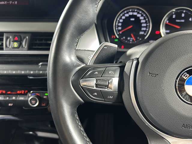 ＢＭＷ Ｘ１ xDrive 18d Mスポーツ 沖縄県 2021(令3)年 3.7万km アルピンホワイトⅢ 禁煙車　/純正ナビ　/（Ｂｌｕｅｔｏｏｔｈ　ＦＭ　ＡＭ　ＵＳＢ）　/バックカメラ/メモリー機能付きパワーシート　/オットマン（N席）　/アダプティブクルーズコントロール　/前後コーナーセンサー　/ＥＴＣ　/パドルシフト/電動パーキングブレーキ/USBポート/LEDヘッドライト/純正アルミホイール/衝突被害軽減ブレーキ/車線逸脱警報機能