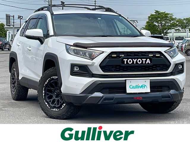 トヨタ ＲＡＶ４ アドベンチャー オフロードPKG 道央・札幌 2022(令4)年 1.8万km スーパーホワイトⅡ ４WD/寒冷地仕様/社外メモリーナビ/CD/DVD/BT/フルセグ/トヨタセーフティセンス/プリクラッシュセーフティ/横滑り防止装置/レーダークルーズコントロール/ダウンヒルアシストコントロール/レーンキープアシスト/コーナーセンサー/ブラインドスポットモニター/リアクロストラフィックアラート/パーキングサポートブレーキ/ロードサインアシスト/バックカメラ/DRIVEMODE切替/自動防眩ミラー/ワイパーデアイサー/D席パワーシート/D席メモリーシート/前席シートヒーター/前席エアシート/レザーシート/革巻きステアリング/ステアリングリモコン/ハンドルヒーター/電動パーキング/ブレーキホールド/MTモード付AT/プッシュスタート/スマートキー/LEDヘッドライト/オートライト/オートハイビーム/フォグランプ/電動格納ミラー/ウィンカーミラー/純正フロアマット/ドアバイザー/純正AW付冬タイヤ積込/225/60/R18/2018年/山7mm/TRDフロントバンパーガーニッシュ