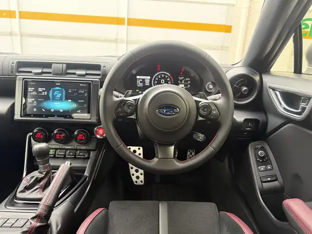 スバル ＢＲＺ STIスポーツ 愛知県 2025(令7)年 0.4万km クリスタルホワイトP /D型//ワンオーナー/禁煙車//bremboゴールドキャリパー//STIフロントアンダースポイラー//STIスカートリップ//リヤアンダーディフューザー//トランクスポイラー//純正９インチサイバーナビ//フルセグ/SD/BT/CD/DVD/MSV/USB//純正リヤビューカメラ//ETC2.0//ドライブレコーダー//ウルトラスエード×本革シート//シートヒーター//BOXERメーター//ダックテールトランクリッド//アクティブサウンドコントロール//Vタワーバー//トルセンLSD//ミシュランパイロットスポーツ4/純正18インチAW//TRC/VSC//TRACKモード//SPORT/SNOWモード//パドルシフト/MTモード付きAT//アイサイト//PCS/ACC/LDW//後退時ブレーキアシスト//AT誤発進抑制制御/AT誤後進抑制制御//SRVD//ふらつき警報/先行車発進お知らせ機能//クリアランスソナー//フルLEDオートヘッドライト//ハイビームアシスト/SRH//デイタイムランニングライト//STIプッシュエンジンスイッチ/スペアスマートキー//革巻きステアリング/ステアリングリモコン//チルト＆テレスコピックステアリング//スポーツアルミペダル//フロアカーペットSTI//D記録簿R６//保証書/取扱説明書/ナビ取扱説明書