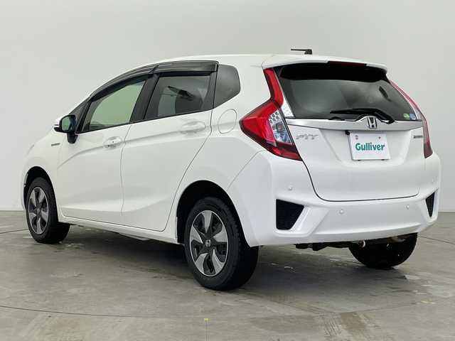 ホンダ フィット ハイブリット Fパッケージ 富山県 2017(平29)年 7.9万km タフホワイトⅡ 社外ナビ（CN-B200D）/（AM/FM/CD/AUX)/バックカメラ/前後ドライブレコーダー/横滑り防止装置/前後コーナーセンサー/ウィンカーミラー/ドアバイザー/プッシュスタート/スマートキー/スペアキーあり/社外フロアマット/アイドリングストップ/ETC/ABS/取扱説明書/保証書