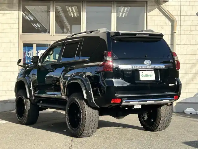 トヨタ ランドクルーザー プラド TX アルジェントクロス 岩手県 2015(平27)年 9.7万km アティチュードブラックマイカ リフトアップ/オーバーフェンダー/社外ＳＤナビ　/バックカメラ　/スタッドレスセット積込　/革調シートカバー/フルセグＴＶ　/プッシュスタート/スマートキー　/フロントワイパーデアイサー　/電格ミラー　/ビルトインＥＴＣ　/クルーズコントロール　/ウッドコンビステアリング　/横滑り防止装置　/取説　ナビ取説