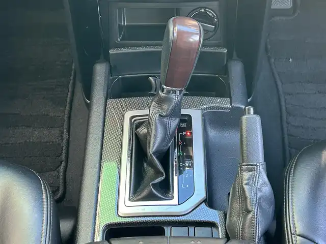 トヨタ ランドクルーザー プラド TX アルジェントクロス 岩手県 2015(平27)年 9.7万km アティチュードブラックマイカ リフトアップ/オーバーフェンダー/社外ＳＤナビ　/バックカメラ　/スタッドレスセット積込　/革調シートカバー/フルセグＴＶ　/プッシュスタート/スマートキー　/フロントワイパーデアイサー　/電格ミラー　/ビルトインＥＴＣ　/クルーズコントロール　/ウッドコンビステアリング　/横滑り防止装置　/取説　ナビ取説