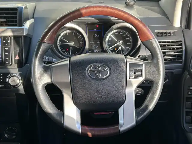 トヨタ ランドクルーザー プラド TX アルジェントクロス 岩手県 2015(平27)年 9.7万km アティチュードブラックマイカ リフトアップ/オーバーフェンダー/社外ＳＤナビ　/バックカメラ　/スタッドレスセット積込　/革調シートカバー/フルセグＴＶ　/プッシュスタート/スマートキー　/フロントワイパーデアイサー　/電格ミラー　/ビルトインＥＴＣ　/クルーズコントロール　/ウッドコンビステアリング　/横滑り防止装置　/取説　ナビ取説