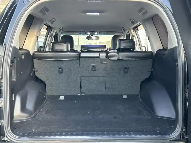 トヨタ ランドクルーザー プラド TX アルジェントクロス 岩手県 2015(平27)年 9.7万km アティチュードブラックマイカ リフトアップ/オーバーフェンダー/社外ＳＤナビ　/バックカメラ　/スタッドレスセット積込　/革調シートカバー/フルセグＴＶ　/プッシュスタート/スマートキー　/フロントワイパーデアイサー　/電格ミラー　/ビルトインＥＴＣ　/クルーズコントロール　/ウッドコンビステアリング　/横滑り防止装置　/取説　ナビ取説