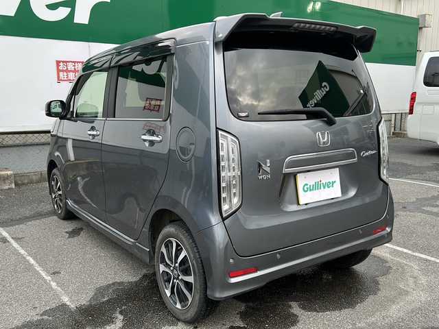 ホンダ Ｎ ＷＧＮ カスタム L ホンダセンシング 福島県 2022(令4)年 1.6万km シャイニンググレーM 純正ナビ/(CD再生/FM/AM/BT)/クルコン/ＥＴＣ/ホンダセンシング/電格ミラー/コーナーセンサー/ＵＳＢポート/D席シートヒーター/オートライト/スマートキー/プッシュスタート/ＬＥＤライト/フォグライト/ドアバイザー/ワンオーナー/バックカメラ/４ＷＤ/純正フロアマット/純正エアロ/ABS