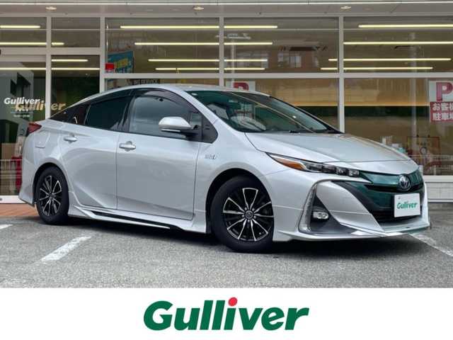トヨタ プリウス ＰＨＶ S 岐阜県 2017(平29)年 6.5万km シルバーM 純正ディーラーOPナビ/【Bluetooth．CD.TV.AM/FM】/エアロパーツ(モデリスタ)/充電ケーブル/ステアリングヒーター/クルーズコントロール/衝突軽減ブレーキ/車線逸脱防止装置/バックカメラ/スマートキー/LEDヘッドライト・オート機能付/オートマチックハイビーム/積込スタッドレスタイヤ/ETC/ドライブレコーダー/純正フロアマット/ドアバイザー/保証書/取扱説明書/スペアキー