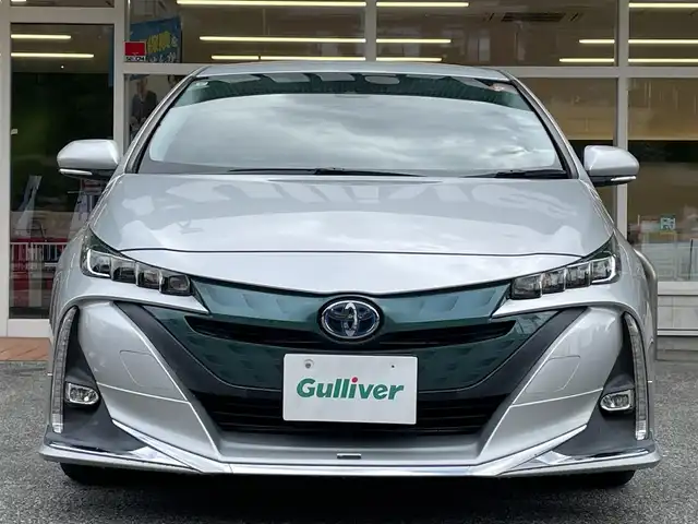 トヨタ プリウス ＰＨＶ S 岐阜県 2017(平29)年 6.5万km シルバーM 純正ディーラーOPナビ/【Bluetooth．CD.TV.AM/FM】/エアロパーツ(モデリスタ)/充電ケーブル/ステアリングヒーター/クルーズコントロール/衝突軽減ブレーキ/車線逸脱防止装置/バックカメラ/スマートキー/LEDヘッドライト・オート機能付/オートマチックハイビーム/積込スタッドレスタイヤ/ETC/ドライブレコーダー/純正フロアマット/ドアバイザー/保証書/取扱説明書/スペアキー