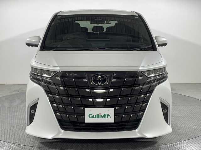 トヨタ アルファード Z 広島県 2024(令6)年 0.6万km プラチナホワイトパールマイカ 左右独立ムーンルーフ/純正14型ディスプレイオーディオ/純正フリップダウンモニター/パノラミックビューモニター/デジタルインナーミラー/カラーヘッドアップディスプレイ/ユニバーサルステップ/トヨタチームメイト/・アドバンストパーク/・アドバンストドライブ/両側パワースライドドア/パワーバックドア/ブラック合皮シート/シートヒーター/ベンチレーション/パワーシート/ステアリングヒーター/パワーオットマン/電動サンシェード/セーフティセンス/・プリクラッシュセーフティ/・レーントレーシングアシスト/・レーンディパーチャーアラート/・フロントクロストラフィックアラート/・レーンチェンジアシスト/・レーダークルーズコントロール/・アダプティブハイビーム/・プロアクティブドライビングアシスト/3眼LEDヘッドランプ/純正18インチAW/ETC2.0/ドライブレコーダー/USB/HDMI入力端子/アクセサリーコンセント（AC100V/100W）