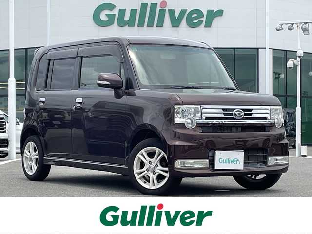 ダイハツ ムーヴ コンテ カスタム G 佐賀県 2012(平24)年 11万km プラムブラウンクリスタルマイカ 社外HDDナビ/・フルセグTV/CD/DVD/SD/Bluetooth/アイドリングストップ/ETC/コラムシフト/ISOFIX対応/革巻きステアリング/社外14インチアルミホイール/純正キセノンヘッドライト/純正フォグライト/純正フロアマット/純正ドアバイザ―/新車保証書/取扱説明書