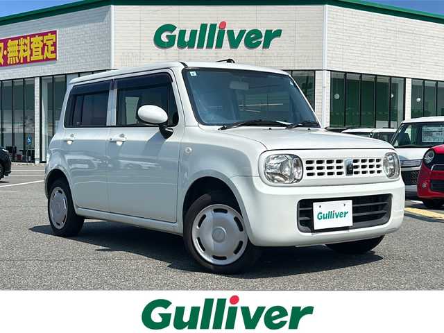 スズキ ラパン G 鳥取県 2013(平25)年 6.3万km パールホワイト 社外ナビ/ワンセグ/CD/プッシュエンジンスタート/ハロゲンヘッドライト/純正ホイールキャップ/アイドリングストップ/スマートキー/スペアキー/ドバイザー/フロアマット