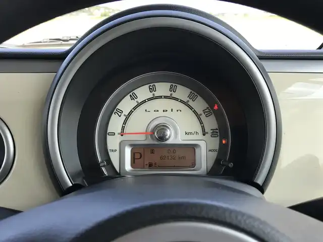 スズキ ラパン G 鳥取県 2013(平25)年 6.3万km パールホワイト 社外ナビ/ワンセグ/CD/プッシュエンジンスタート/ハロゲンヘッドライト/純正ホイールキャップ/アイドリングストップ/スマートキー/スペアキー/ドバイザー/フロアマット