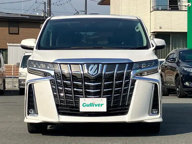 トヨタ アルファード S Cパッケージ 静岡県 2020(令2)年 5.8万km ホワイトパールクリスタルシャイン 純正10インチナビ（CD/DVD/BT/フルセグ）/純正12.1インチ後席モニター/バックカメラ/ツインサンルーフ/電動リアゲート/D席N席パワーシート/D席N席シートヒーター/D席N席エアシート/N席電動オットマン/２列目電動リクライニング/２列目電動オットマン/純正フロアマット車載/純正エントランスマット車載/シーケンシャルウインカー/三眼LEDヘッドライト/ステアリングヒーター/エンジンスタートボタン/パワーステアリング/パワーウィンドウ/100V充電/保証書/取扱説明書/記録簿/スマートキー/レーダークルーズコントロール/ETC/USB入力端子/三列シート/ウォークスルー/両側パワースライドドア/純正18インチアルミホイール/ABS/横滑り防止装置/コーナーセンサー前後/レーンキープアシスト/盗難防止装置/オートライト/オートマチックハイビーム/W+サイドエアバック/衝突軽減システム/カーテンエアバック