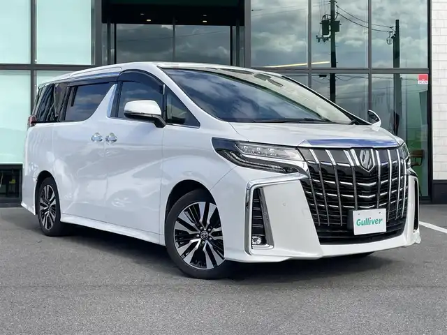 トヨタ アルファード S Cパッケージ 愛媛県 2020(令2)年 5.8万km ホワイトパールクリスタルシャイン 純正10型ナビ(フルセグTV/BT/CD/DVD)/純正12.1型フリップダウンモニター/ツインムーンルーフ/黒革温冷電動シート/運転席シートメモリー機能/後席エグゼクティブパワーシート/両側電動スライドドア/バックカメラ/トヨタセーフティセンス/レーダークルーズコントロール/衝突被害軽減装置/車線逸脱防止装置/クリアランスソナー/電動リアゲート/フロアマット車載/三眼LEDライト/シーケンシャルウインカー/100V/100Wコンセント/ステアリングリモコン/ヒーター/リバース連動サイドミラー/電動パーキングブレーキ/現状サマー(純正AW)(235/50/R18)/TOYOTIRES TRANPATH mp7/ETC/禁煙車