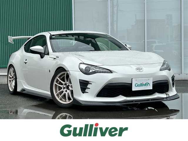 トヨタ ８６ G 福岡県 2019(令1)年 10.9万km クリスタルホワイトパール GTウィング/フルエアロ/Defiメーター/A’PEXi製ターボ/BLITZ製オイルフィルター/ROSSOMODELLO製マフラー/ITARU製ホイール/盗難防止装置/横滑り防止装置/純正ナビ/Bluetooth/フルセグTV/ipod/USB/ETC2.0/アルカンターラ/社外フロアマット/衝突被害軽減ブレーキ