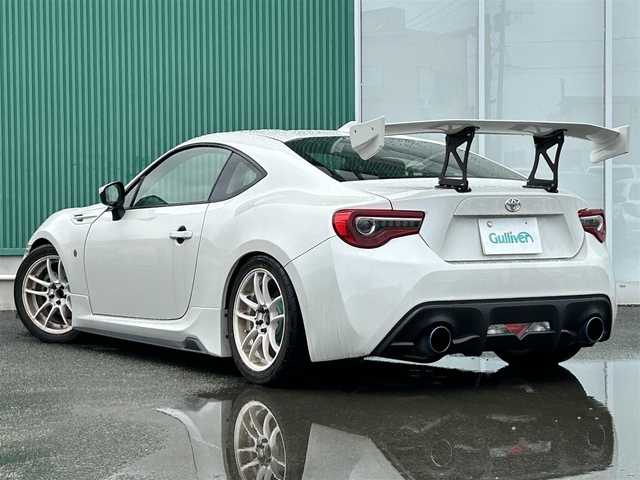 トヨタ ８６ G 福岡県 2019(令1)年 10.9万km クリスタルホワイトパール GTウィング/フルエアロ/Defiメーター/A’PEXi製ターボ/BLITZ製オイルフィルター/ROSSOMODELLO製マフラー/ITARU製ホイール/盗難防止装置/横滑り防止装置/純正ナビ/Bluetooth/フルセグTV/ipod/USB/ETC2.0/アルカンターラ/社外フロアマット/衝突被害軽減ブレーキ
