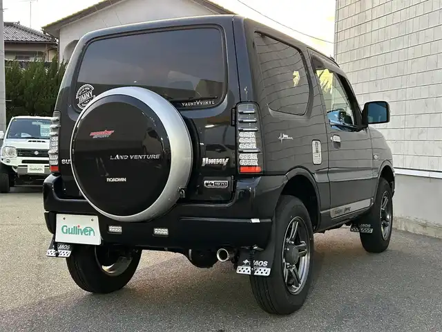スズキ ジムニー ランドベンチャー 山形県 2017(平29)年 4.4万km ブルーイッシュブラックパール3 4WD/5速マニュアル/社外サス（純正有り）/社外マフラー（純正有り）/前後ドライブレコーダー/追加ブーストメーター/社外LEDテールランプ/レザーシート/リモコンキー/ヒートヒータ（D）/ETC/フォグランプ/純正16インチアルミホイール/アルミ付きスタッドレス有り/保証書、取扱説明書