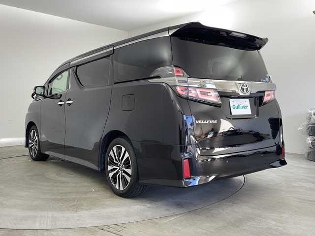 トヨタ ヴェルファイア Z Gエディション 兵庫県 2018(平30)年 2.3万km バーニングブラッククリスタルシャインガラスフレーク ・純正9インチナビ/CD/DVD/SD/BT/TV/・バックカメラ/・トヨタセーフティセンス/・レーントレーシングアシスト/・クリアランスソナー/・プロアクティブドライビングアシスト/・ロードサインアシスト/・先行車発進告知/・オートマチックハイビーム/・レーダークルーズコントロール/・両側パワースライドドア/・パワーバックドア/・ステアリングヒーター/・前席シートヒーター/・前席シートベンチレーション/・メモリー機能付きパワーシート/・２列目エグゼクティブシート/・革シート/・オットマンシート/・nanoe/・３眼LEDオートライト/・LEDフォグランプ/・シーケンシャルウィンカー/・純正ビルトインETC/・スマートキー