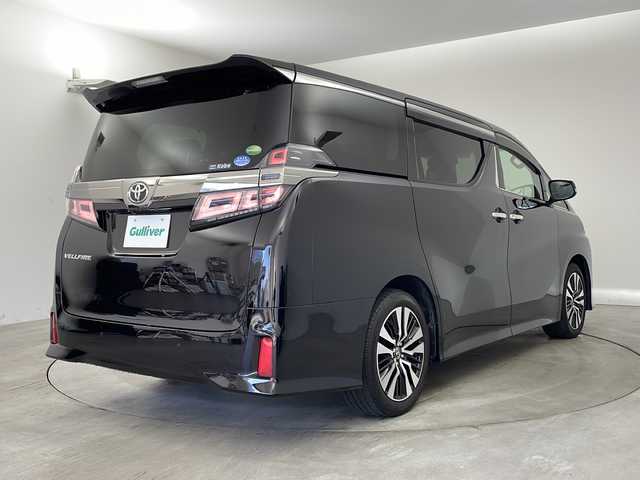 トヨタ ヴェルファイア Z Gエディション 兵庫県 2018(平30)年 2.3万km バーニングブラッククリスタルシャインガラスフレーク ・純正9インチナビ/CD/DVD/SD/BT/TV/・バックカメラ/・トヨタセーフティセンス/・レーントレーシングアシスト/・クリアランスソナー/・プロアクティブドライビングアシスト/・ロードサインアシスト/・先行車発進告知/・オートマチックハイビーム/・レーダークルーズコントロール/・両側パワースライドドア/・パワーバックドア/・ステアリングヒーター/・前席シートヒーター/・前席シートベンチレーション/・メモリー機能付きパワーシート/・２列目エグゼクティブシート/・革シート/・オットマンシート/・nanoe/・３眼LEDオートライト/・LEDフォグランプ/・シーケンシャルウィンカー/・純正ビルトインETC/・スマートキー