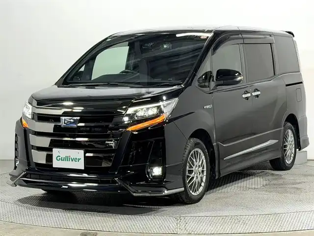トヨタ ノア ハイブリッド Si ダブルバイビーⅡ 大阪府 2020(令2)年 6.2万km ブラック モデリスタエアロ 純正10incナビTV バックカメラ フリップダウンモニター ハーフレザー シートヒーター クルーズコントロール 衝突軽減B レーンアシスト 両側パワースライドドア 前後ドライブレコーダー ETC2.0