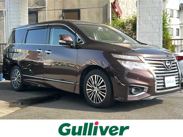 日産 エルグランド 250ハイウェイスター プレミアム 京都府 2016(平28)年 13.2万km インペリアルアンバーP 純正HDDナビ/フルセグTV/アラウンドビューモニター/ブレーキアシスト/後席モニター（フリップダウンモニター）/両側電動スライドドア/前後コーナーセンサー/ドライブレコーダー/電動リアゲート/前後ドライブレコーダー/LEDヘッドライト/パワーシート/MTモード付/スマートキー/運転席＋助手席シートヒーター/ETC/オットマン/プッシュスタート/フロントフォグライト/ウィンカーミラー/ウッドパネル