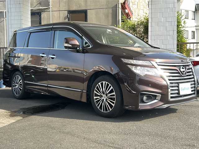 日産 エルグランド 250ハイウェイスター プレミアム 京都府 2016(平28)年 13.2万km インペリアルアンバーP 純正HDDナビ/フルセグTV/アラウンドビューモニター/ブレーキアシスト/後席モニター（フリップダウンモニター）/両側電動スライドドア/前後コーナーセンサー/ドライブレコーダー/電動リアゲート/前後ドライブレコーダー/LEDヘッドライト/パワーシート/MTモード付/スマートキー/運転席＋助手席シートヒーター/ETC/オットマン/プッシュスタート/フロントフォグライト/ウィンカーミラー/ウッドパネル