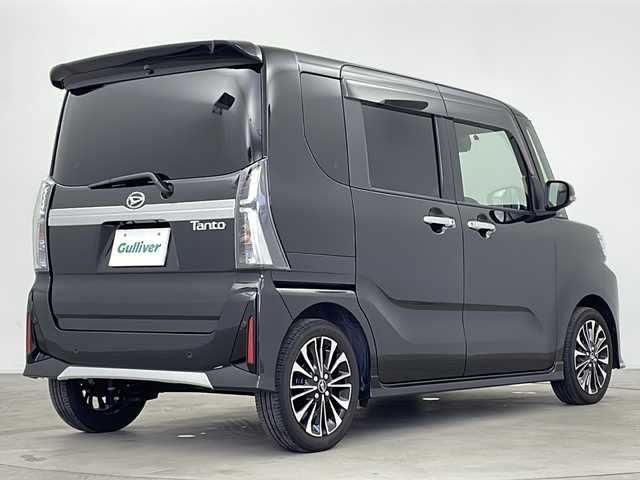 ダイハツ タント カスタム RS 鹿児島県 2025(令7)年 0.2万km ブラックマイカメタリック ワンオーナー/スマートキー×2/純正9インチディスプレイオーディオ/バックカメラ/両側パワースライドドア/D/N席シートヒーター/ビルトインETC/純正フロアマット/衝突被害軽減ブレーキ/純正15インチアルミホイール/ハーフレザーシート/前後コーナーセンサー/電子パーキング/保証書/取扱説明書