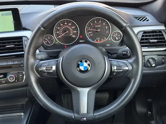 ＢＭＷ ３２０ｉ グランツーリスモ 山梨県 2016(平28)年 1.8万km グレー パノラマサンルーフ/harman/kardon/黒革/純正HDDナビ/バックカメラ/コーナーセンサー/前席シートヒーター/オートライト/HIDヘッドライト/純正19インチAW/電動リアゲート/ETC/スペアキー