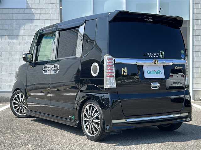 ホンダ Ｎ ＢＯＸ カスタム G ターボ Lパッケージ 宮崎県 2016(平28)年 6.5万km スマートブラック 社外SDナビ【AVIC-RZ99】（Bluetooth/CD/DVD/TV）/バックカメラ/フルセグTV/クルーズコントロール/両側パワースライドドア/ETC/ステアリングリモコン/オートライト/電動格納ミラー/シティブレーキアクティブシステム/車高調/社外テールライト/社外ウィンカーライト/社外ヘッドライト