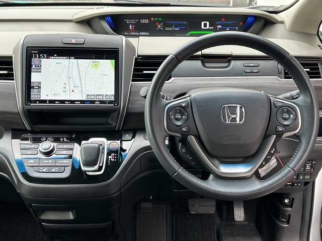 ホンダ フリード ハイブリット G ホンダセンシング 広島県 2020(令2)年 3.1万km プラチナホワイトパール 禁煙/ホンダセンシング/・衝突軽減ブレーキ/・LKAS/・アダプティブクルーズコントロール/・誤発進抑制制御/・標識認識機能/コーナーセンサー/純正8型ナビ（VXM-207VFi）/・フルセグ/CD/DVD/Bluetooth/SD/MusicRack/バックカメラ/オートライト/ステアリングスイッチ/LEDヘッドライト+アクティブコーナリングライト/オートリトラミラー/Cパッケージ/・ロールサンシェード/・シートヒーター（D/N）/・コンフォートビューパッケージ/・IRカット/UVカットガラス/・プラズマクラスターエアコン/Sパッケージ/・コンビシート＆専用インテリア/・15インチアルミホイール/・本革巻ステアリングホイール/・シートバックアッパーポケット/スマートキー/プッシュスタート/スペアキー/純正ドアバイザー/ETC
