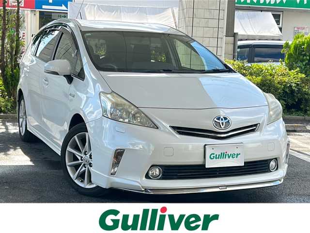 トヨタ プリウス α S ツーリングセレクション 東京都 2012(平24)年 4.3万km ホワイトパールクリスタルシャイン ワンオーナー/純正HDDナビ/・BT/USB/USB/バックモニター/ビルトインETC/純正モデリスタフルエアロ/純正フロアマット/純正アルミホイール/横滑り防止装置/盗難防止装置/アンチブレーキングシステム/オートライト/Ｗ・サイドカーテンエアバッグ/保証書・取扱説明書