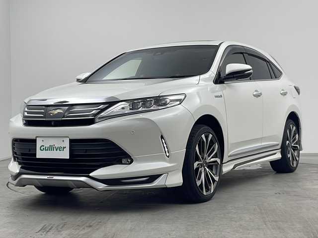 トヨタ ハリアー ハイブリッド プログレス メタル&レザーP 三重県 2020(令2)年 2.5万km ホワイトパールクリスタルシャイン 純正ナビ/・フルセグ・Bluetooth・CD・DVD・Blu-ray・SD/サンルーフ/モデリスタフルエアロ/モデリスタOPAW/JBLサウンド/アラウンドビューモニター/前席パワーシート（運転席メモリ付き）/前席シートヒーター/前席ベンチレーション/パワーバックドア/トヨタセーフティセンス/・プリクラッシュセーフティ/・オートマチックハイビーム/・レーントレーシングアシスト/・レーダークルーズコントロール/・ロードサインアシスト/AC100V/電子パーキング/ビルトインETC2.0/前方ドライブレコーダー
