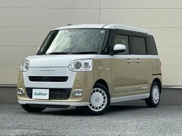 ダイハツ ムーヴ キャンバス ストライプス G ターボ 茨城県 2022(令4)年 2.5万km シャイニングホワイトパール/サンドベージュメタリック 純正ナビ/(AM/FM/CD/DVD/Bluetooth)/フルセグ/純正前方ドライブレコーダー/ETC/クルーズコントロール/両側パワースライドドア/前席シートヒーター/衝突軽減ブレーキ/横滑り防止措置/アイドリングストップ/コーナーセンサー/純正ドアバイザー/純正フロアマット/フォグランプ/プッシュスタート/スマートキー