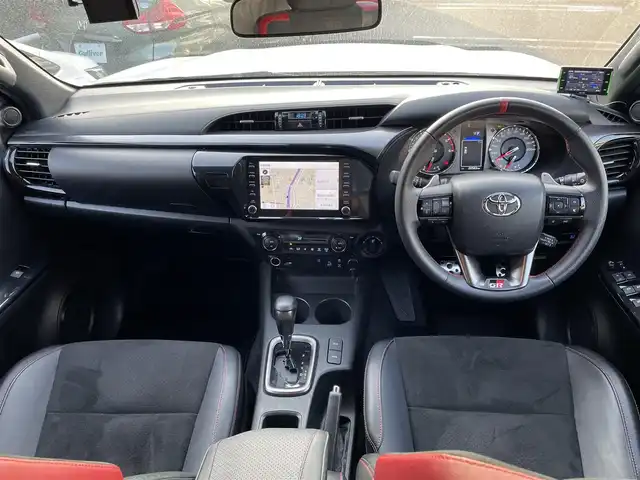 トヨタ ハイラックス Z GRスポーツ 福岡県 2022(令4)年 2万km スーパーホワイトⅡ 純正8型ナビ/（BT/CarPlay/Miracast/AM/FM)/全方位モニター/トヨタセーフ/コーナーセンサー/レーダークルコン/パドルシフト/ETC/ドラレコ前後/純正GRフロアマット/ダウンヒルアシスト/アイドリングストップ/ビルシュタインB8リフトアップショックKIT/MINIZリフトアップKIT(5inch)/ソリッドレーシングタービンZ1　17inchAW/NITTO TRAIL GRAPPLER M/T/EGR製バグガード/天張りブラックEDの物に換装済/トランクゲートダンパー/ウィンカーポジション/スチールサイドステップ/オーバーフェンダー
