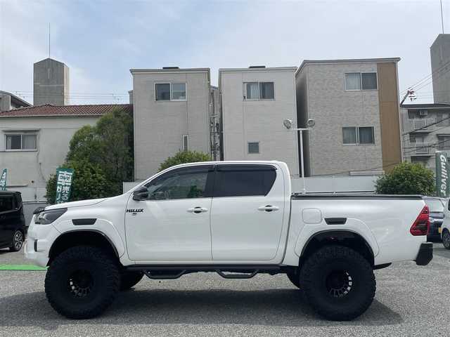 トヨタ ハイラックス Z GRスポーツ 兵庫県 2022(令4)年 2.1万km スーパーホワイトⅡ ・ビルシュタイン B8リフトアップショックKIT/・MINIZリフトアップKIT(2inch UP)/・ソリッドレーシングタービンZ1　17inch/・NITTO TRAIL GRAPPLER M/T/（外径36インチ）/・EGR製バグガード/・純正ディスプレイオーディオ/・ナビキット/・BT/Apple Car　Play/Miracast/AM/FM)/・パノラミックビューモニター/・クリアランスソナー/・プリクラッシュセーフティ/・レーダークルーズコントロール/・レーンディパーチャーアラート/・ロードサインアシスト/・先行車発進お知らせ/・パドルシフト/・ETC/・ドライブレコーダー前後/・純正GRフロアマット/・ダウンヒルアシスト/・アイドリングストップ/・トランクラゲッジカバー/ウィンカーポジション/スチールサイドステップ/オーバーフェンダー