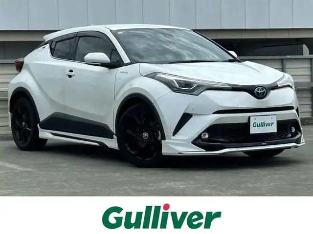 トヨタ Ｃ－ＨＲ G モード ネロ 静岡県 2019(令1)年 6.8万km ホワイトパールクリスタルシャイン 特別仕様車/モデリスタフルエアロ/トヨタセーフティセンス/ＡＬＰＩＮＥ９型メモリナビ/フルセグＴＶ/ＤＶＤ再生/ＢＴオーディオ/バックカメラ/ETC/追従機能付クルコン/LDA（レーンディパーチャーアラート）/PKSB（パーキングサポートブレーキ）/ハーフレザーシート/シートヒーター/オートライト/オートハイビーム/LEDヘッドライト/純正18AW