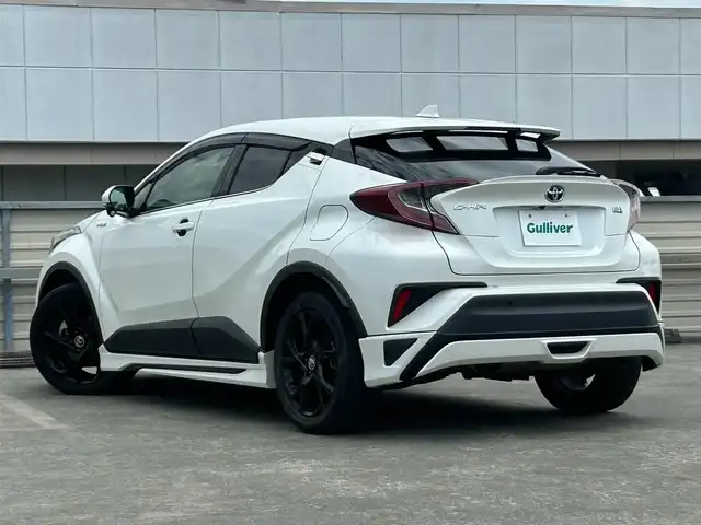 トヨタ Ｃ－ＨＲ G モード ネロ 静岡県 2019(令1)年 6.8万km ホワイトパールクリスタルシャイン 特別仕様車/モデリスタフルエアロ/トヨタセーフティセンス/ＡＬＰＩＮＥ９型メモリナビ/フルセグＴＶ/ＤＶＤ再生/ＢＴオーディオ/バックカメラ/ETC/追従機能付クルコン/LDA（レーンディパーチャーアラート）/PKSB（パーキングサポートブレーキ）/ハーフレザーシート/シートヒーター/オートライト/オートハイビーム/LEDヘッドライト/純正18AW