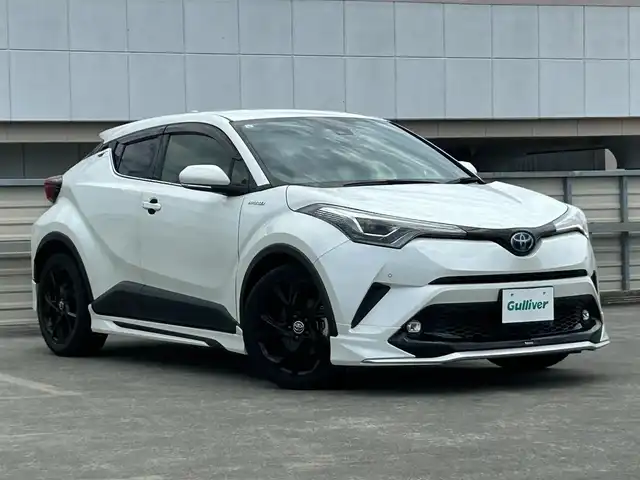 トヨタ Ｃ－ＨＲ G モード ネロ 静岡県 2019(令1)年 6.8万km ホワイトパールクリスタルシャイン 特別仕様車/モデリスタフルエアロ/トヨタセーフティセンス/ＡＬＰＩＮＥ９型メモリナビ/フルセグＴＶ/ＤＶＤ再生/ＢＴオーディオ/バックカメラ/ETC/追従機能付クルコン/LDA（レーンディパーチャーアラート）/PKSB（パーキングサポートブレーキ）/ハーフレザーシート/シートヒーター/オートライト/オートハイビーム/LEDヘッドライト/純正18AW